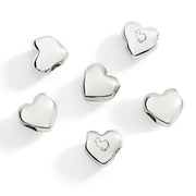 Set di sei componenti a forma di cuore in argento 925, dettagli lucidi e raffinati.